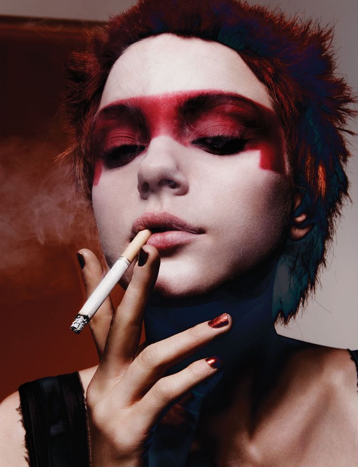 smoking girl with bright makeup
