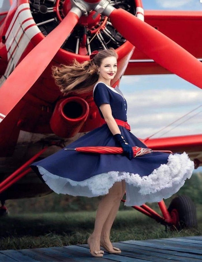 retro girl with airplane - photo