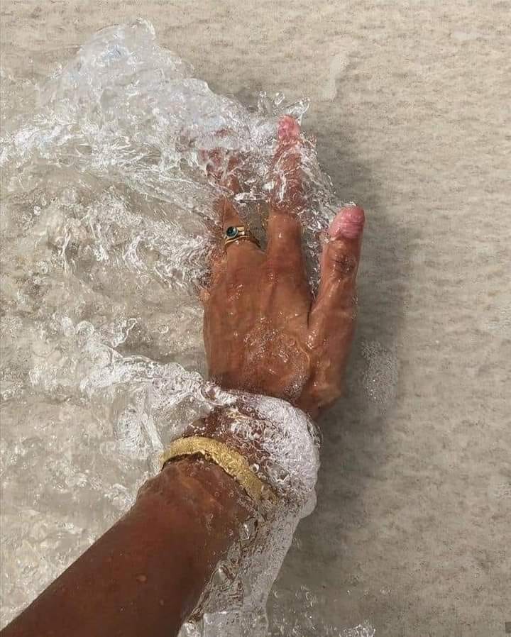 hand in sea water